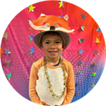 boy wearing silly hat